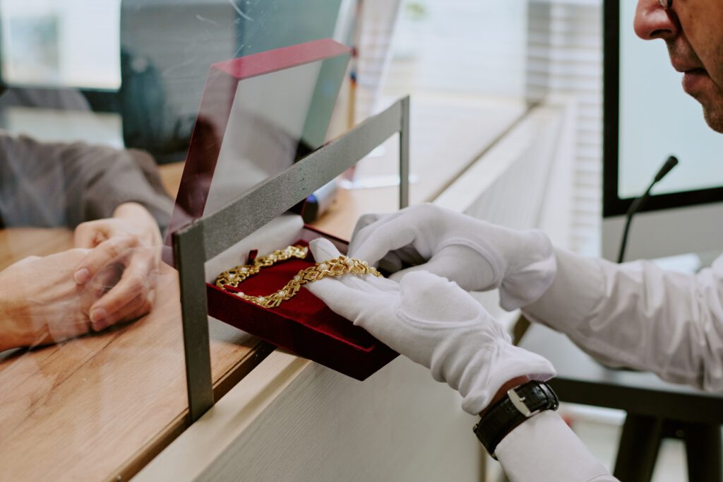 Presenting Elegant Gold Jewelry in Luxurious Box
